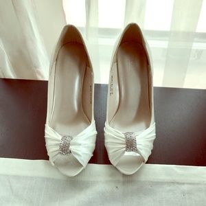 Ivory peep toe pumps